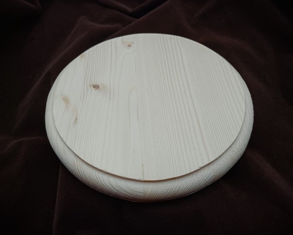 Large round softwood pattress manufactured from pine 