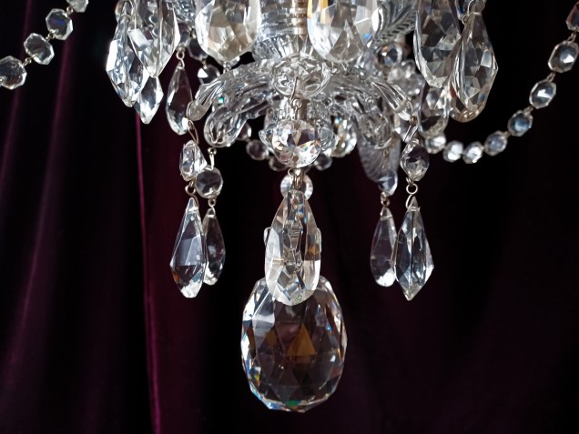 Perry and Co 6 arm cut glass and crystal chandelier dating from the early 20th Century