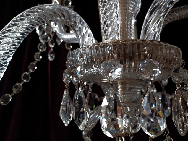 Perry and Co 6 arm cut glass and crystal chandelier dating from the early 20th Century