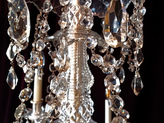 Perry and Co 6 arm cut glass and crystal chandelier dating from the early 20th Century