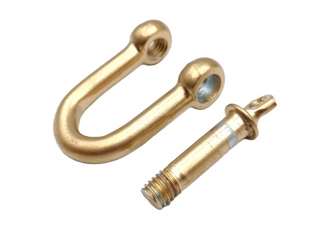 Gold coloured shackles 