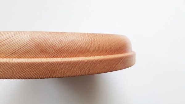 Large round softwood pattress , manufactured from pine