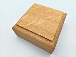 Square ceiling pattress or plinth manufactured from white Oak