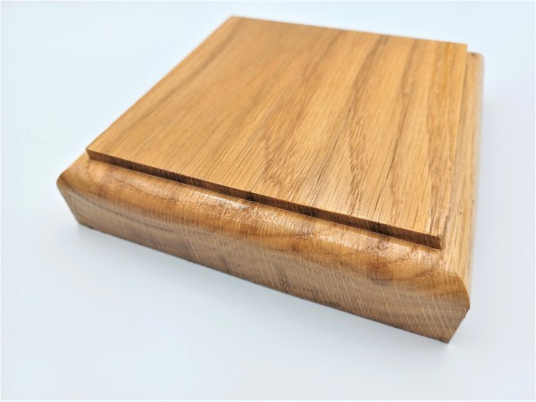 Square ceiling pattress manufactured from Oak. 125mm varnished